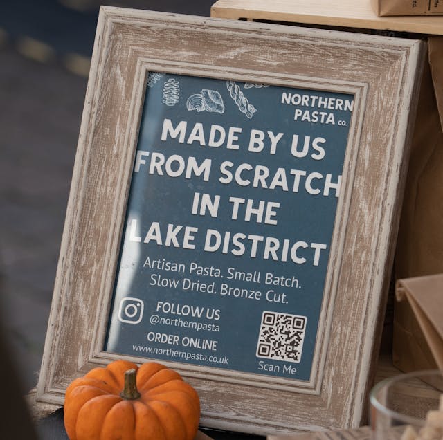 The QR code printed on a paper and framed. A Pumpkin on the bottom.