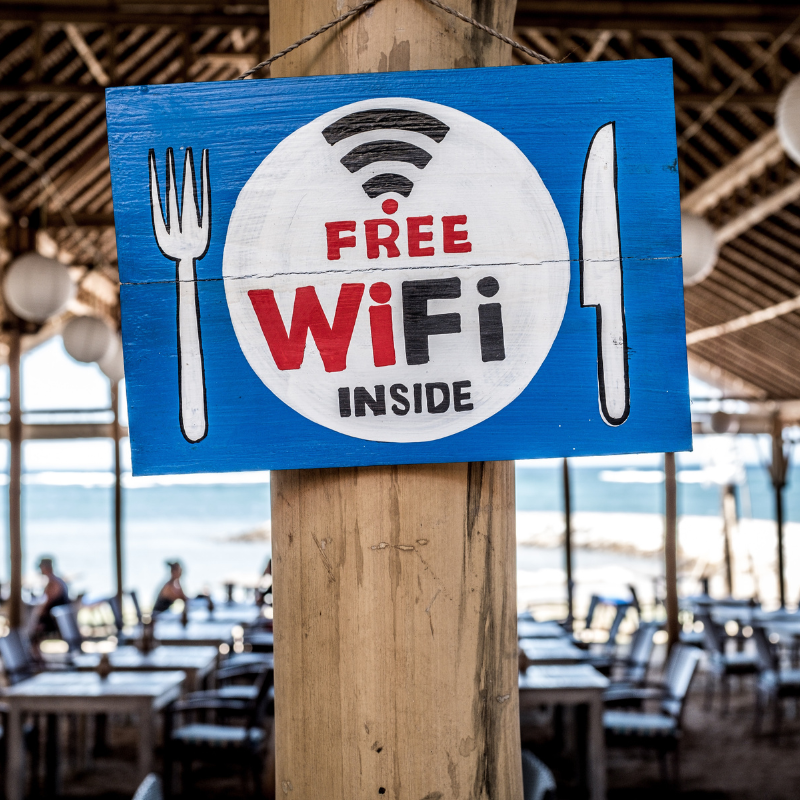 A photo of an information sign that says "Free WiFi inside".