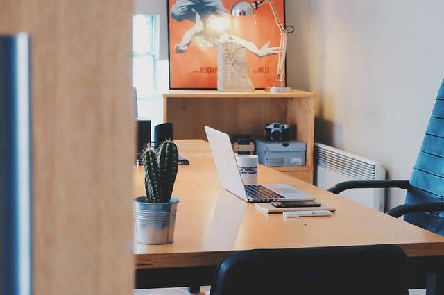 A laptop is lying on a table.